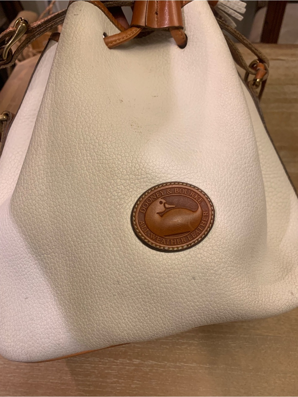 Vintage Dooney & Burke White and Brown Drawstring Bucket Bag with Tassel Accent - Picture 2 of 15